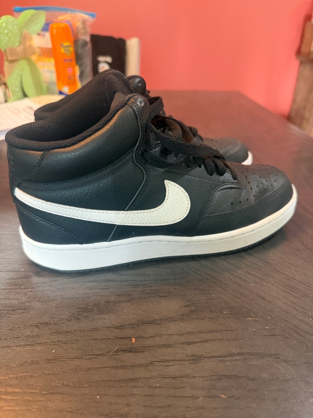 Nike Black and White High-Top Sneakers with Swoosh